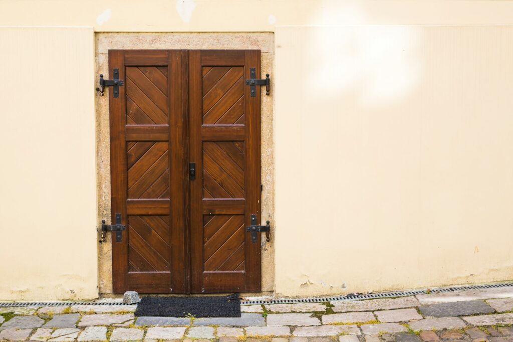 A front entrance of a home with a door